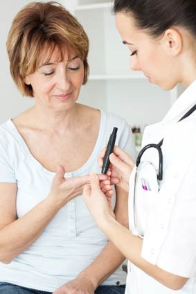 Finger pricking to check blood glucose level BGL to check for Diabetes