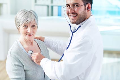 Doctor examining a senior Australian woman